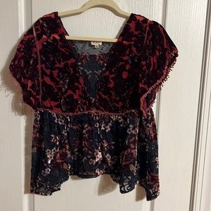 Velvet look polyester top, sheer with rich colors and raised floral patterns